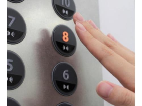 a person pressing the eight button on a remote control at Sun Hotel Tosu Saga - Vacation STAY 49470v in Tosu