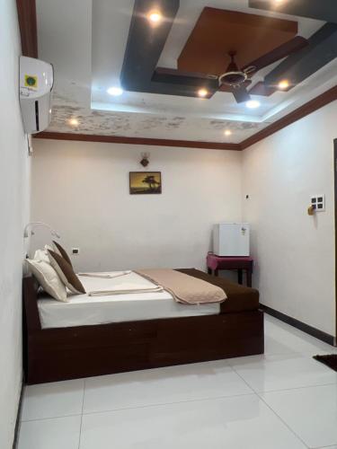 Cama o camas de una habitación en Sunset Ville Beach Resort