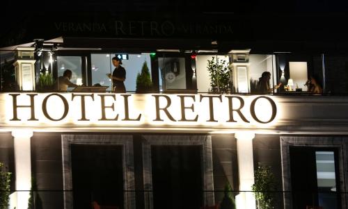 a hotel rector sign on top of a building at Hotel Retro in Batumi