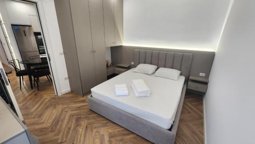 Katil atau katil-katil dalam bilik di Blue sand apartments