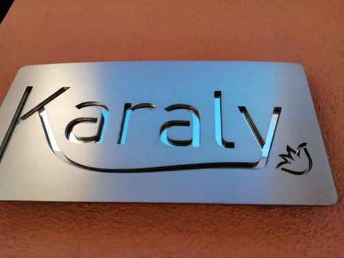 a sign that says kenya on a wall at Karaly - Casa vacanze posto auto/moto in Cagliari