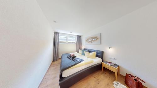 Apartment LANDECK-CITYにあるベッド