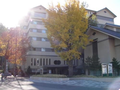 a building with a tree in front of it at Aeria Tohno - Vacation STAY 62232v in Tōno