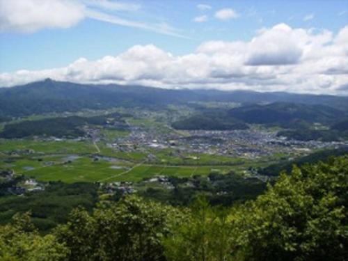 a view of a city from the top of a mountain at Aeria Tohno - Vacation STAY 62232v in Tōno