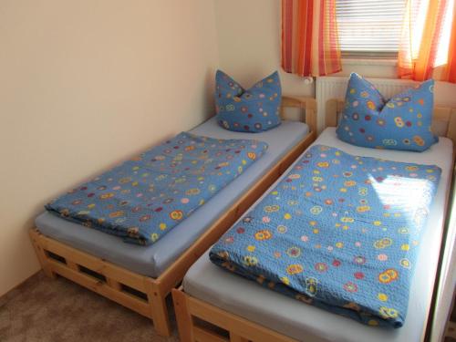 Postel nebo postele na pokoji v ubytování Ferienhaus Bolliger Apartment 1