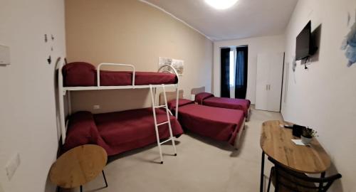 Ένα ή περισσότερα κρεβάτια σε δωμάτιο στο casa johrico