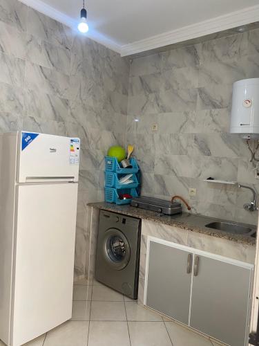 Kuchyň nebo kuchyňský kout v ubytování Mosaic Appartments