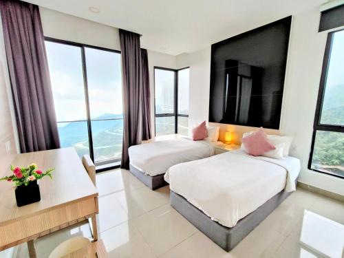 Ένα ή περισσότερα κρεβάτια σε δωμάτιο στο Emerald Homes Cozy Homestay at Ion Delemen Genting Highlands
