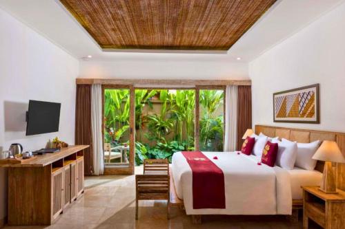 Katil atau katil-katil dalam bilik di Zyandru 1 BR Deluxe Garden View ZN175