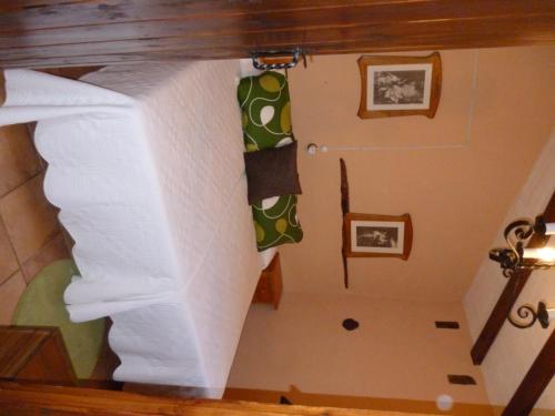 a stairway with a towel hanging from a stair case at Casa El Cantón in La Cuba