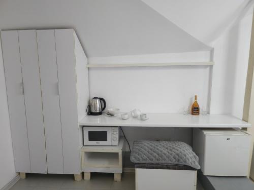 Una cocina o cocineta en Grey Studio