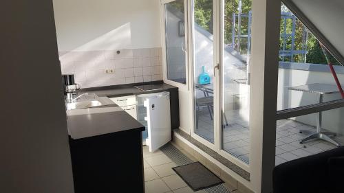 Η κουζίνα ή μικρή κουζίνα στο Hotel und Appartementhaus Rheden