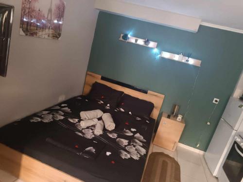 an overhead view of a bedroom with a bed at marias apartment in Mytilini