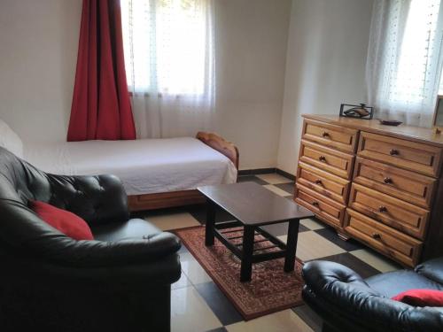 Katil atau katil-katil dalam bilik di Guest House Chez Olga