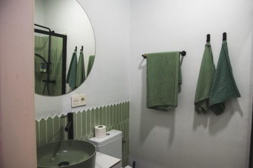 Ένα μπάνιο στο Apartamentos Nueva Ribera