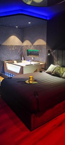Ένα ή περισσότερα κρεβάτια σε δωμάτιο στο Loft, Studio and Love Rooms