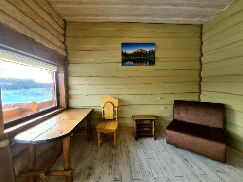 Χώρος καθιστικού στο Cottage Radomyshl'