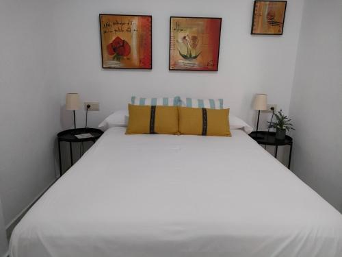 A bed or beds in a room at Pueblo Quinta