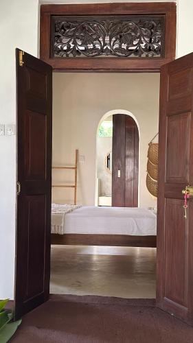 Katil atau katil-katil dalam bilik di Villa Wellia
