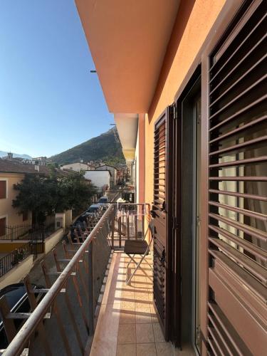 a balcony of a building with a view of a street at House Nonna Nina in Celano