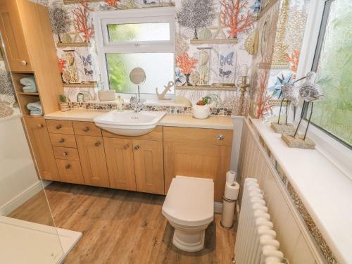 Et badeværelse på Cockle Bay Cottage