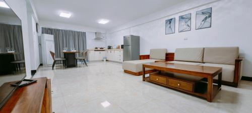 Χώρος καθιστικού στο Ocean Breeze Apartment Hotel