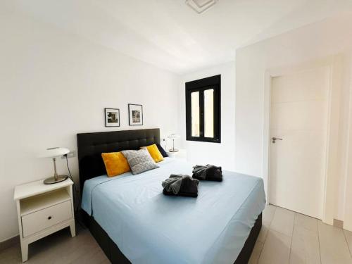 Ένα ή περισσότερα κρεβάτια σε δωμάτιο στο Luxury & New apartment with pool II
