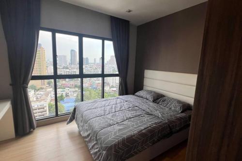 Postel nebo postele na pokoji v ubytování Property khlongsan