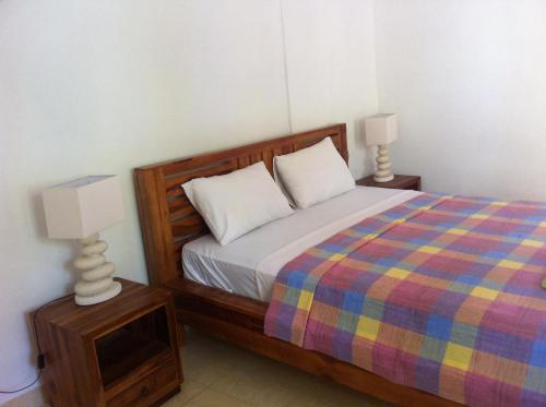 Cama o camas de una habitación en Amed Sari Beach Guesthouse
