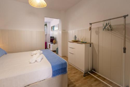 Postel nebo postele na pokoji v ubytování La casita de la abuela