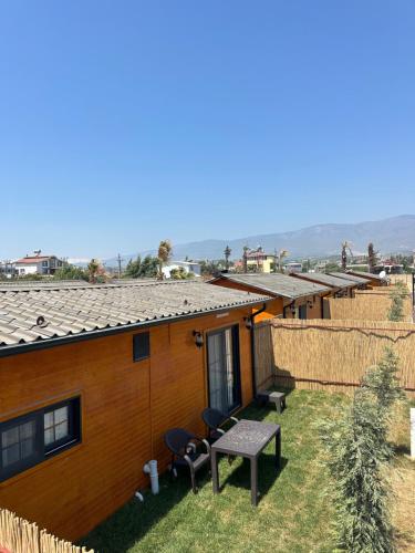 a row of houses with a table and chairs at Some Hotel Antakya in Hatay