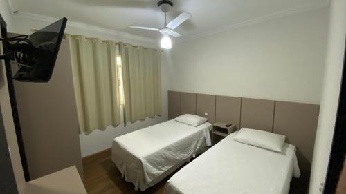 Cama o camas de una habitación en Hotel Esmig
