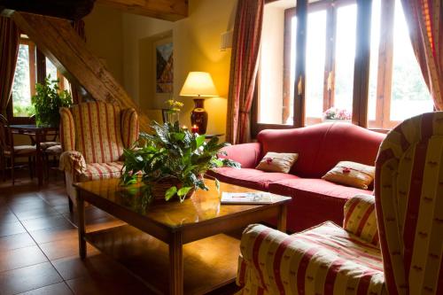 Posezení v ubytování Mauberme Mountain Boutique Hotel