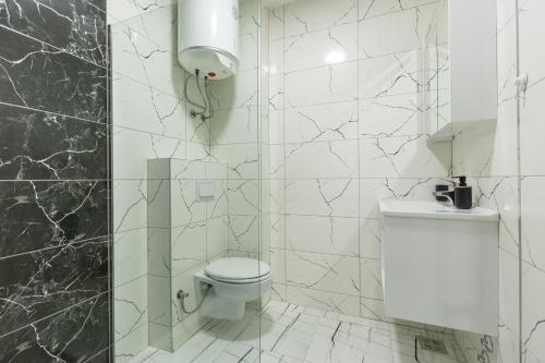 Ένα μπάνιο στο Apartments River
