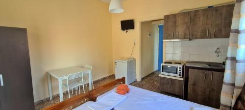 Ένα ή περισσότερα κρεβάτια σε δωμάτιο στο Veranda Rooms to Let