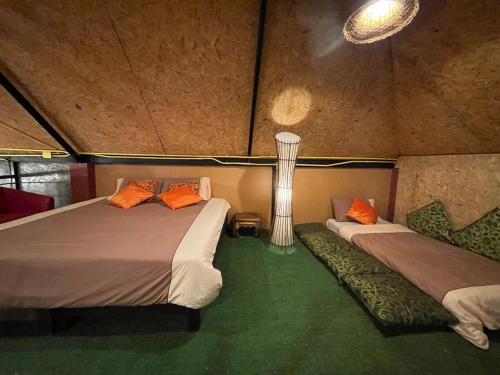 Un ou plusieurs lits dans un hébergement de l'établissement Baibon1 Boutique House Thalang Phuket