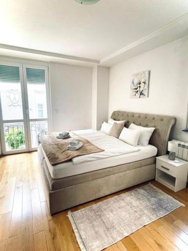 Ένα ή περισσότερα κρεβάτια σε δωμάτιο στο Apartment Delic