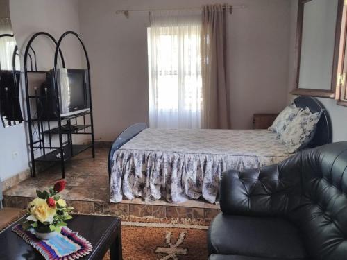 Katil atau katil-katil dalam bilik di Guest House Chez Olga