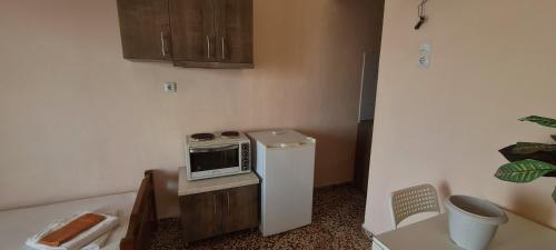 Η κουζίνα ή μικρή κουζίνα στο Veranda Rooms to Let