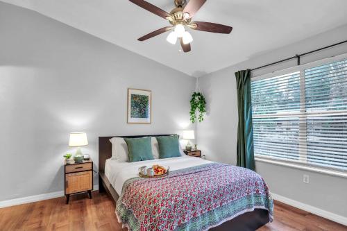 a bedroom with a bed and a ceiling fan at The Prairie at Brighton - UF , Pool , Workspace in Gainesville