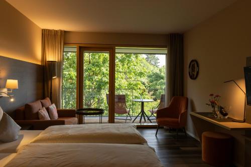 Postel nebo postele na pokoji v ubytování Hotel Knoblauch