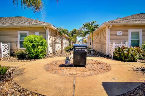 a trash can sitting in the middle of a driveway at Palm Bay 306 in Corpus Christi