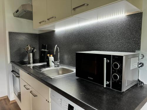 Kuchyň nebo kuchyňský kout v ubytování Ferienwohnung Conny