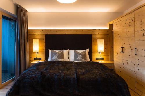 Ένα ή περισσότερα κρεβάτια σε δωμάτιο στο Spa Apartments - Summercard included - Zell am See