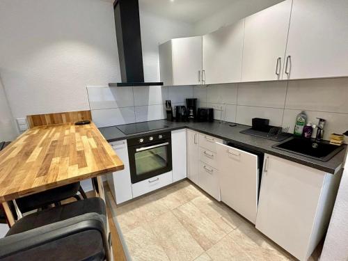 Dapur atau dapur kecil di Exklusives Haus, ruhig gelegen im Innenhof, zentral, lichtdurchflutet Zustellbett,Babybett bei Bedarf