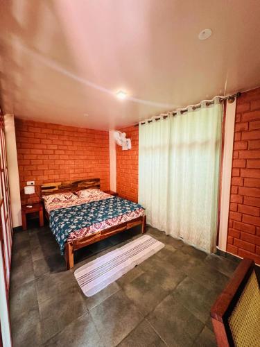 Katil atau katil-katil dalam bilik di Sereno Pool Villa Chikmagalur