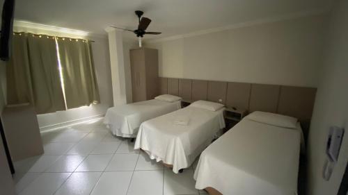 Cama o camas de una habitación en Hotel Esmig