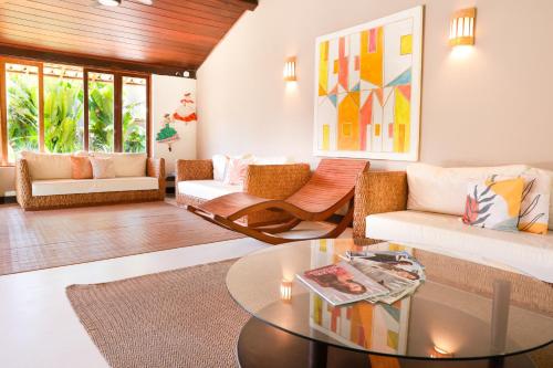 Χώρος καθιστικού στο Hotel Pousada Coqueiros