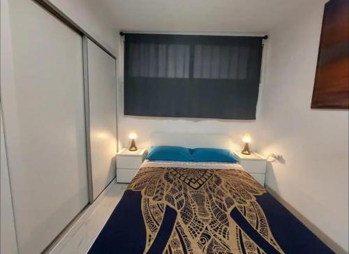 Giường trong phòng chung tại "Soul" Island Refuge Playa de las Américas