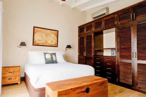 Un ou plusieurs lits dans un hébergement de l'établissement La Concordia - Boutique Hotel